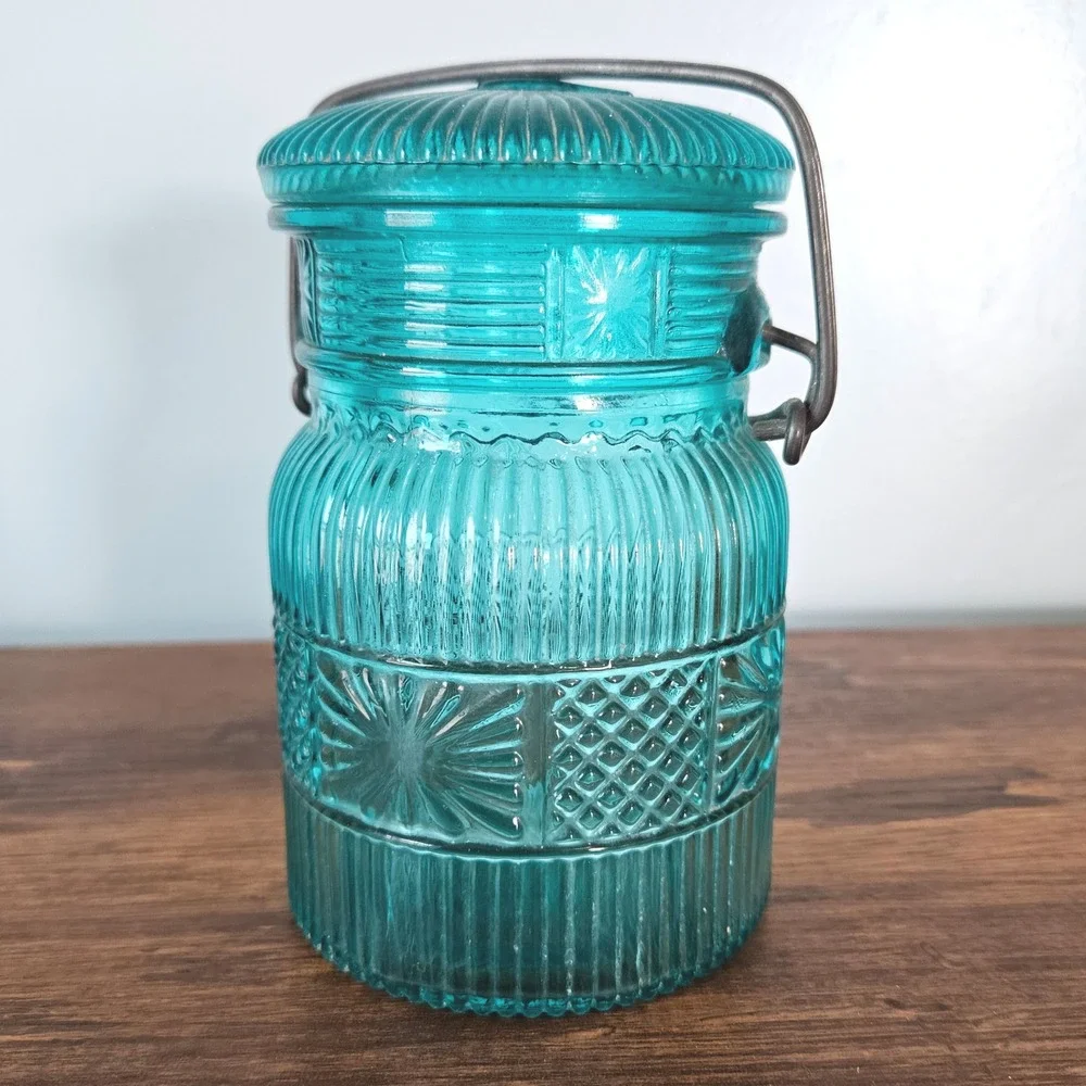 Vintage Avon Teal Blue Glass Jar Wire Bail Handle Sunburst Daisy Button Pattern